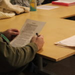 person reading a document