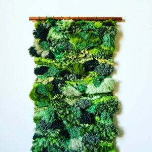 Green artpiece made of fuss